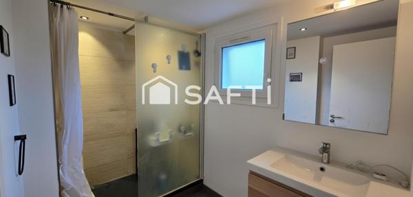 Maison 2 chambres, 1 bureau, Dressing, cave, garage et jardin