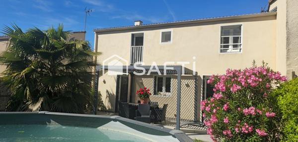 Maison 2 chambres, 1 bureau, Dressing, cave, garage et jardin