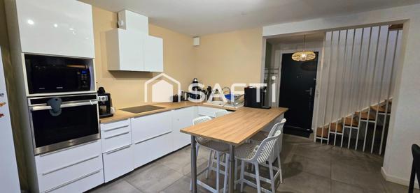 Maison 2 chambres, 1 bureau, Dressing, cave, garage et jardin