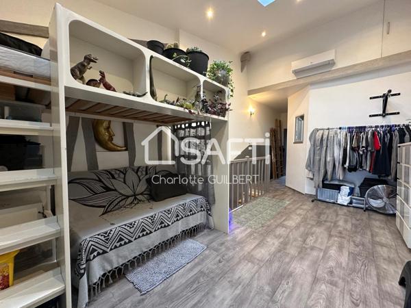 Maison de ville avec terrasse et local commercial