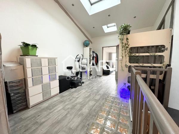 Maison de ville avec terrasse et local commercial