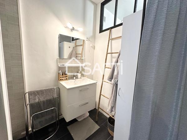 Maison de ville avec terrasse et local commercial