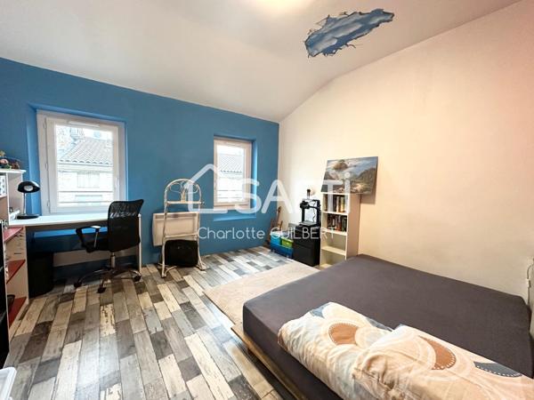 Maison de ville avec terrasse et local commercial