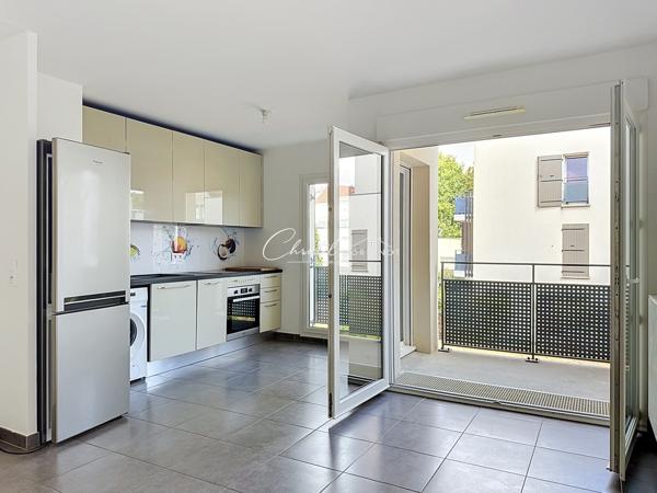 T2 CENTRE BOURG CHESSY DE 40.33m² AVEC PLACE DE PARKING EN SOUS SOL