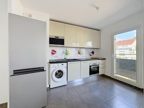 T2 CENTRE BOURG CHESSY DE 40.33m² AVEC PLACE DE PARKING EN SOUS SOL