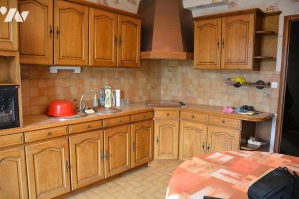 Vente sur SABLE SUR SARTHE maison de ville avec garage et jardin