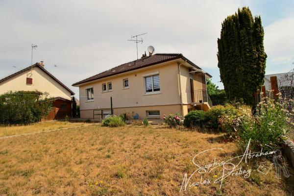 Maison sur sous-sol total avec jardin clos