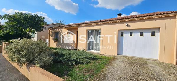 Maison de plain pied proche clinique avec 3 chambres, garage et abri-terrasse.