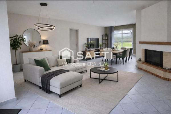 Maison de plain pied proche clinique avec 3 chambres, garage et abri-terrasse.