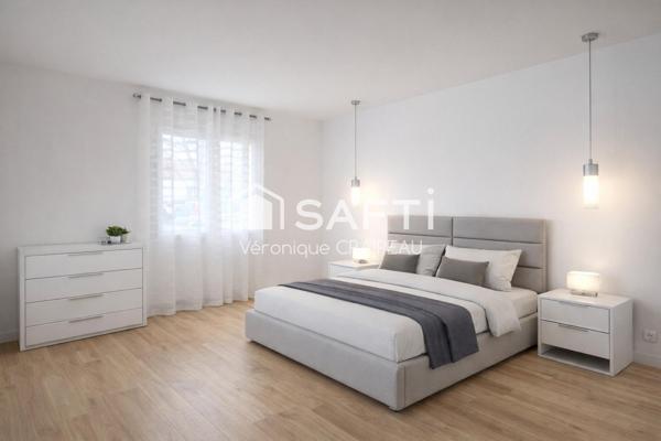 Maison de plain pied proche clinique avec 3 chambres, garage et abri-terrasse.