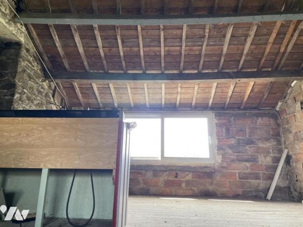 Maison à rénover sur trois niveaux centre Plouguenast