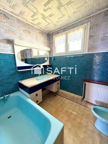 Maison semi-individuelle 120 m² jardin 2 garages