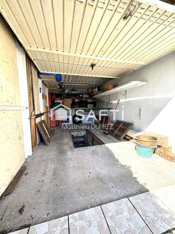 Maison semi-individuelle 120 m² jardin 2 garages