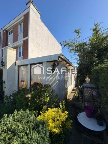 Maison semi-individuelle 120 m² jardin 2 garages