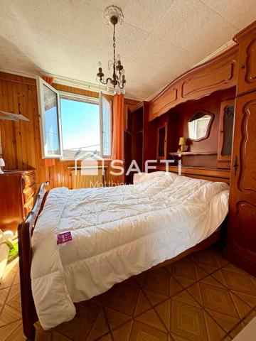 Maison semi-individuelle 120 m² jardin 2 garages