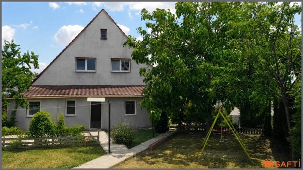 Maison familiale semi-mitoyenne avec jardin