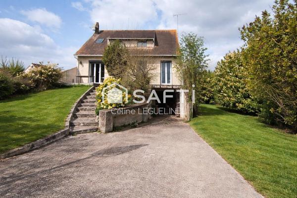 Maison familiale avec jardin, sous-sol total et beaux volumes