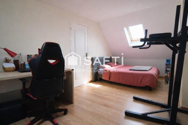 Maison familiale avec jardin, sous-sol total et beaux volumes