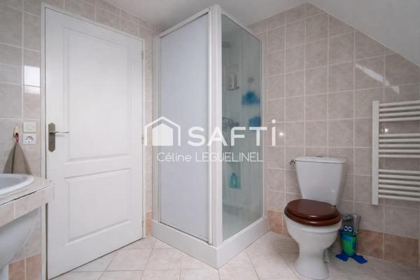 Maison familiale avec jardin, sous-sol total et beaux volumes