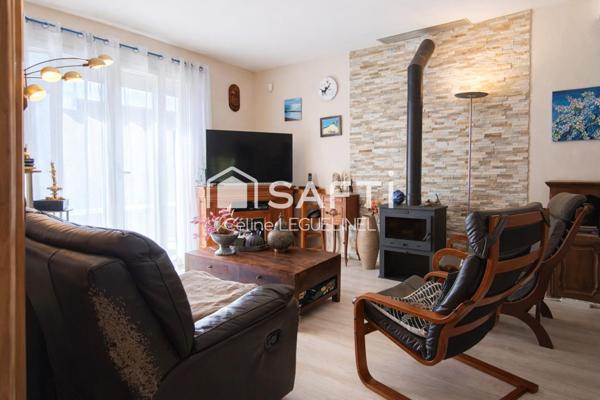 Maison familiale avec jardin, sous-sol total et beaux volumes