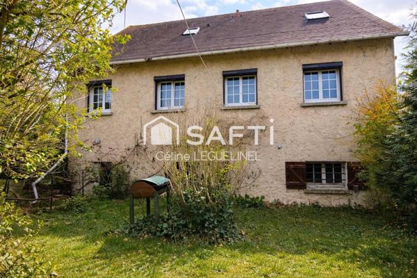 Maison familiale avec jardin, sous-sol total et beaux volumes