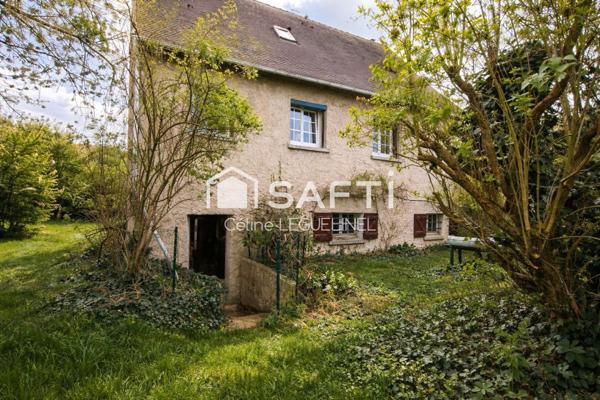 Maison familiale avec jardin, sous-sol total et beaux volumes