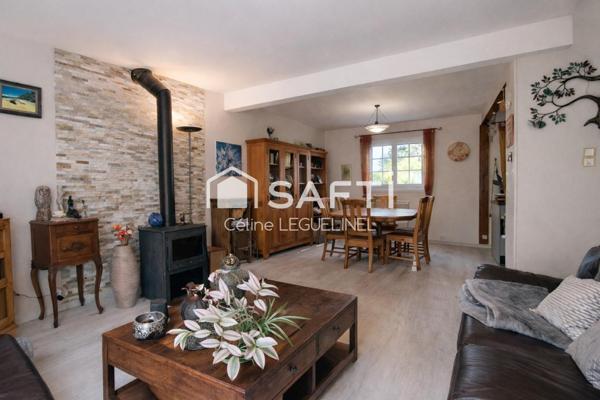 Maison familiale avec jardin, sous-sol total et beaux volumes