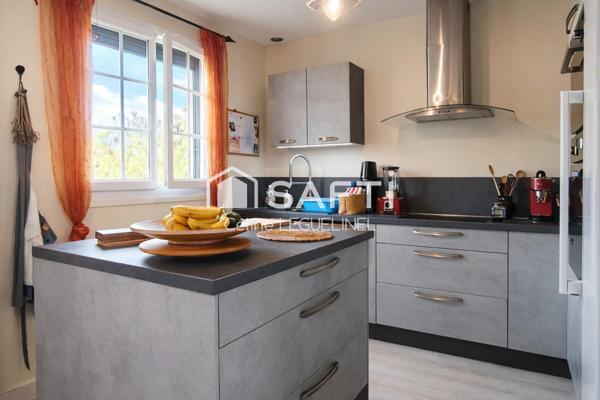 Maison familiale avec jardin, sous-sol total et beaux volumes