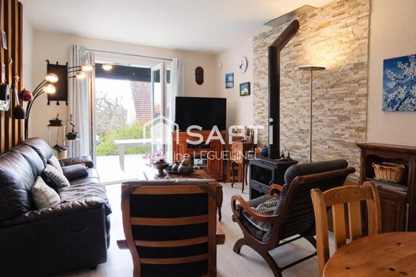 Maison familiale avec jardin, sous-sol total et beaux volumes