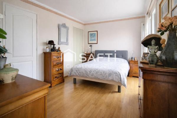 Maison familiale avec jardin, sous-sol total et beaux volumes