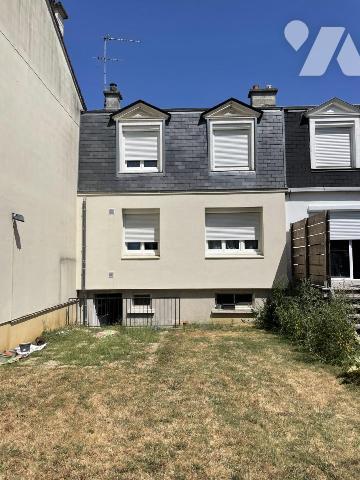 Maison de quartier, 3 chambres, garage, jardin.