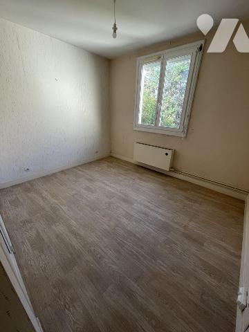 Maison de quartier, 3 chambres, garage, jardin.