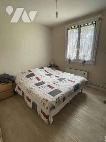 Maison de quartier, 3 chambres, garage, jardin.