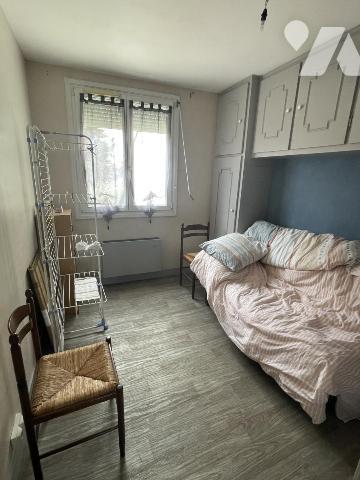 Maison de quartier, 3 chambres, garage, jardin.