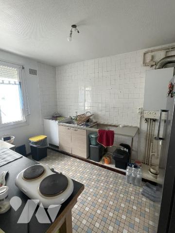 Maison de quartier, 3 chambres, garage, jardin.