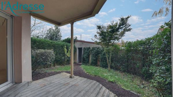 Appartement Rez-de-jardin 2 pièces avec jardin terrasse, jardin privatif et box