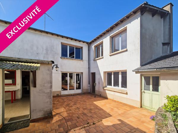 Ensemble immobilier avec terrain constructible et dépendances