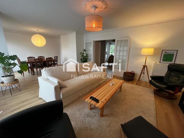 Appartement sans travaux avec 3 chambres, garage et cave.