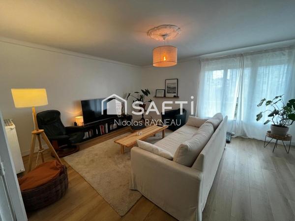 Appartement sans travaux avec 3 chambres, garage et cave.
