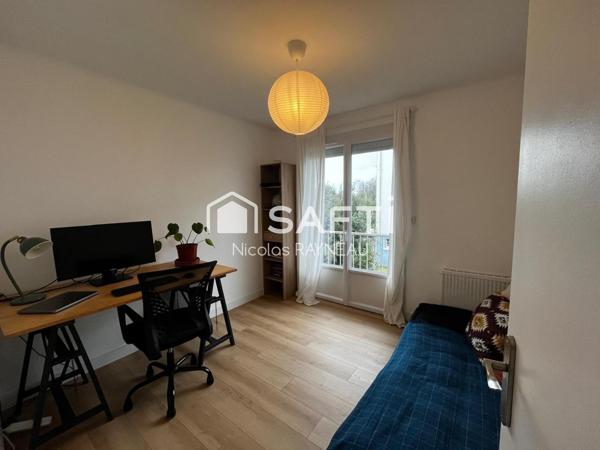 Appartement sans travaux avec 3 chambres, garage et cave.