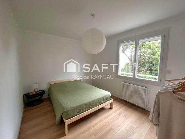 Appartement sans travaux avec 3 chambres, garage et cave.