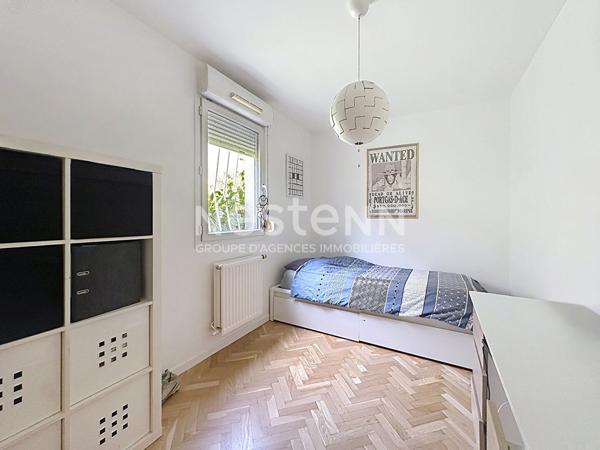 Appartement rez de jardin 4 pièces 3 chambres avec 2 terrasses et une cave - 69008 LYON