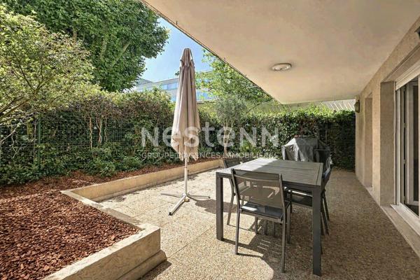 Appartement rez de jardin 4 pièces 3 chambres avec 2 terrasses et une cave - 69008 LYON