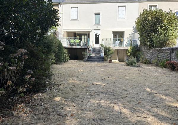 Maison familiale de 138.69 m² de caractère avec 5 chambres, sous-sol complet et stationnement