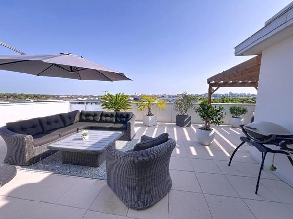 Élégance, confort et luminosité : découvrez ce superbe appartement avec grande terrasse au cœur de Bezannes.