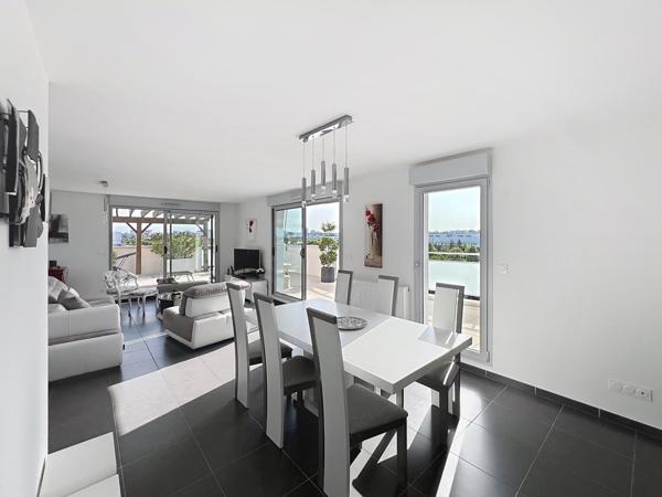 Élégance, confort et luminosité : découvrez ce superbe appartement avec grande terrasse au cœur de Bezannes.