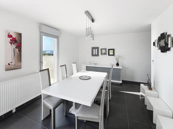 Élégance, confort et luminosité : découvrez ce superbe appartement avec grande terrasse au cœur de Bezannes.