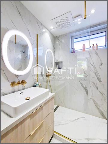 GRAND 2P REFAIT NEUF AVEG JARDIN AU CALME ET CAVE.