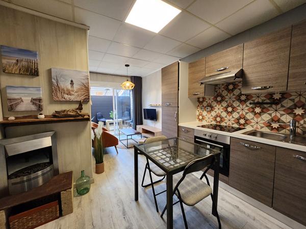 EXCLUSIVITE EN LOCATION APPARTEMENT DE PLAIN PIED DE 29.25M² AVEC COIN CHAMBRE - TERRASSES - PARKINGS - TERRAIN