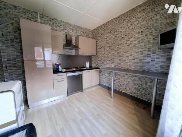 local commercial + appartement et jardin